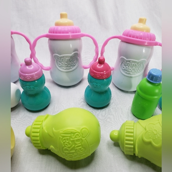 12 Pretend Baby Animal Feeding Bottles Toys - Picture 2 of 4